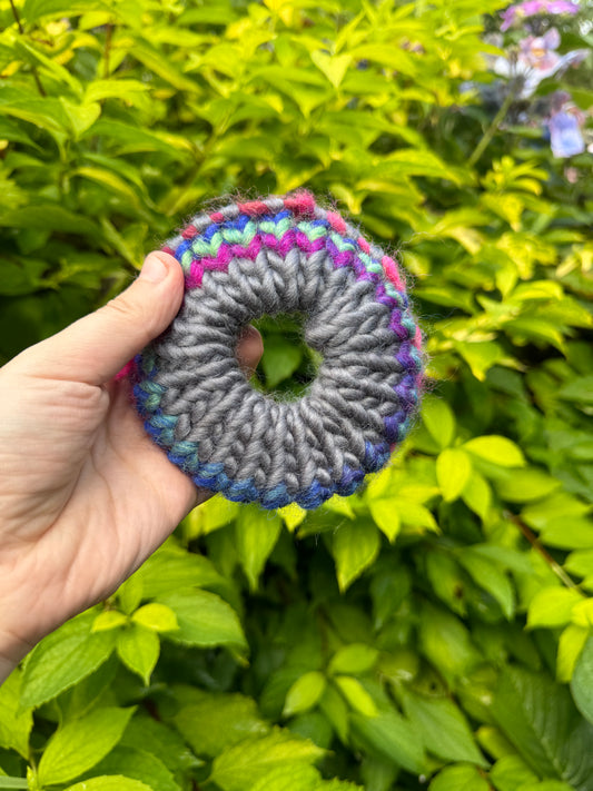 Grey and rainbow knitted scrunchie