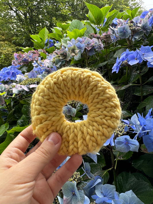 Pastel yellow knitted scrunchie