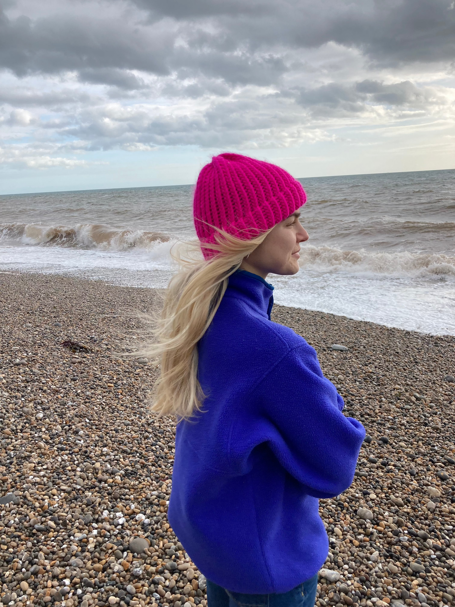 Hand knitted hat in bright neon pink